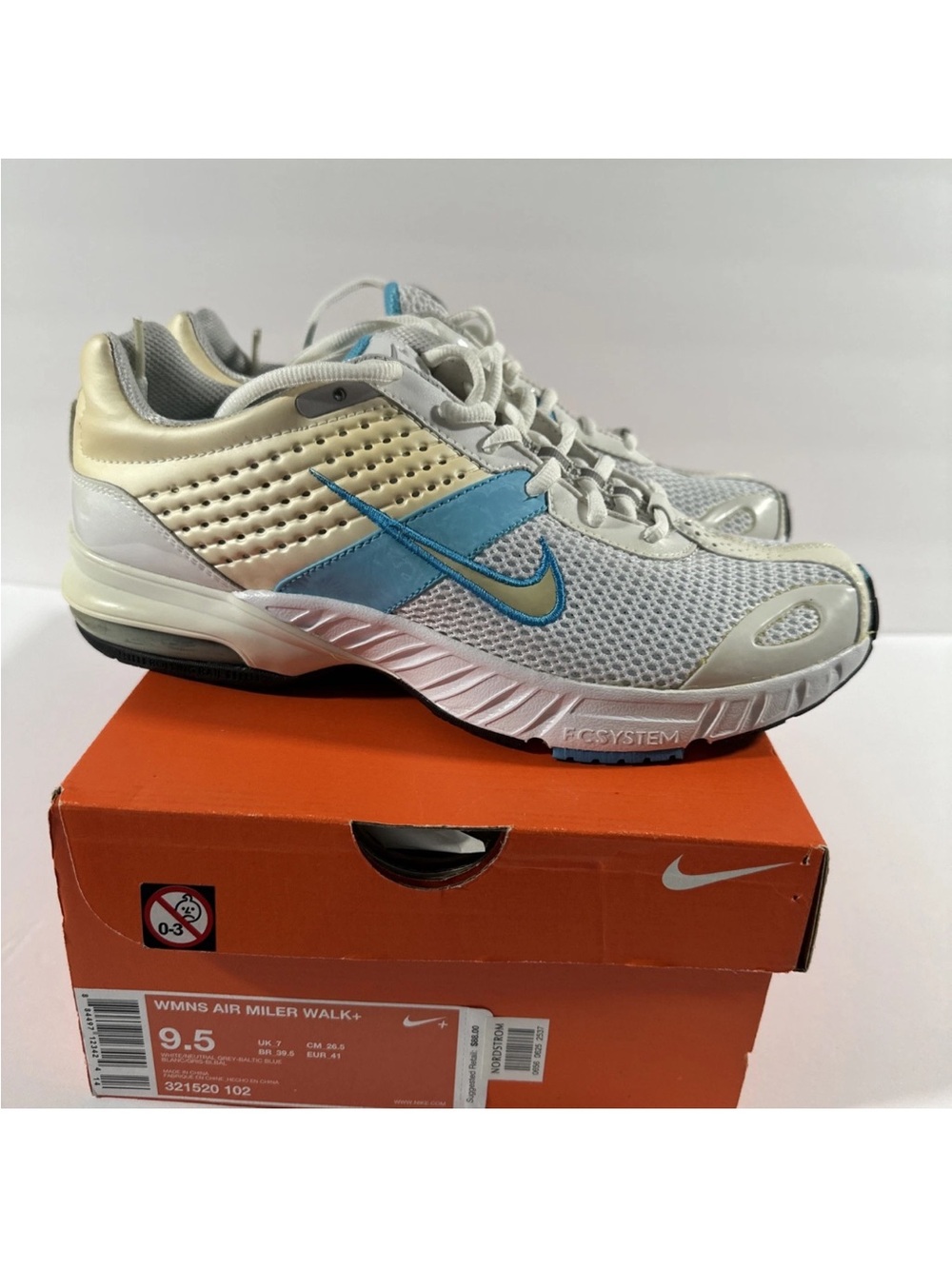 Nike Women’s Athletic Walk Shoes in White, Light Blue, and Gold